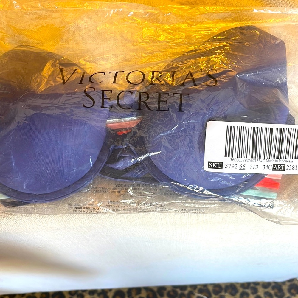 PINK Bra Navy with colorful strap back. Never worn